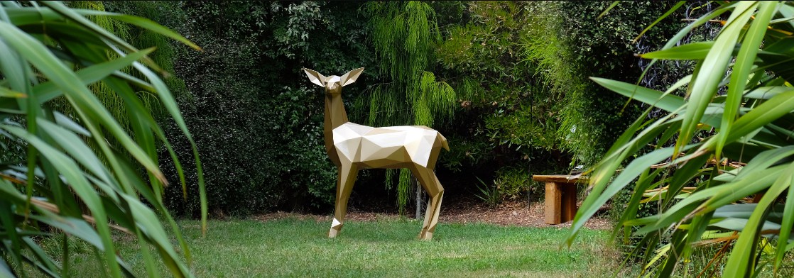 forest glod deer sculpture