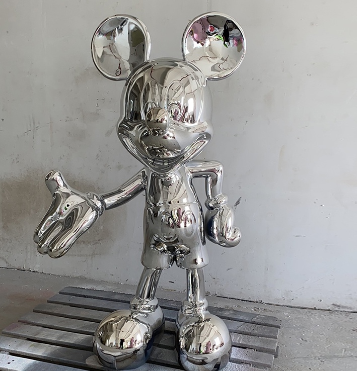 metal Mickey Mouse sculptures in factory