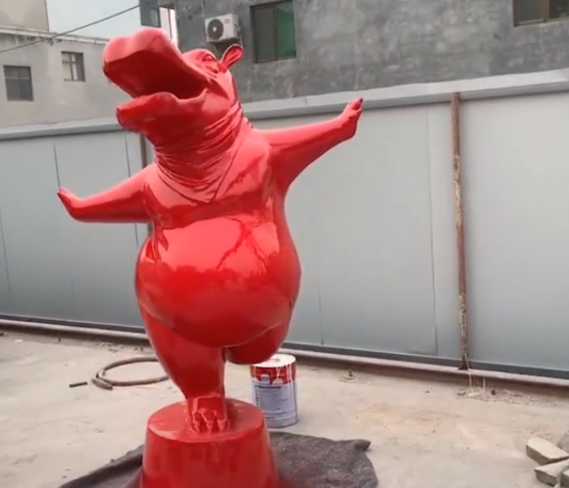 red metal sculpture, bear
