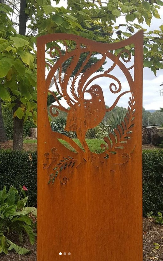 rusted art hollow bird sculpture