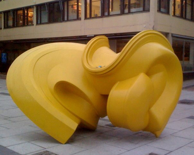 Yellow metal sculpture for street