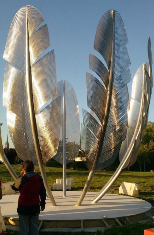 beautiful metal feather art park sculpture install