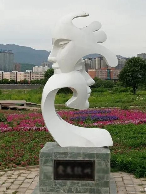 creative white metal sculpture face