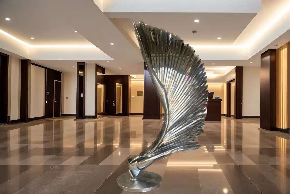 stainless steel lobby wing sculpture