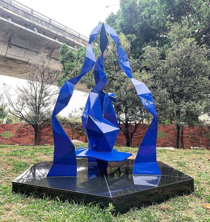 Metal origami crane sculpture