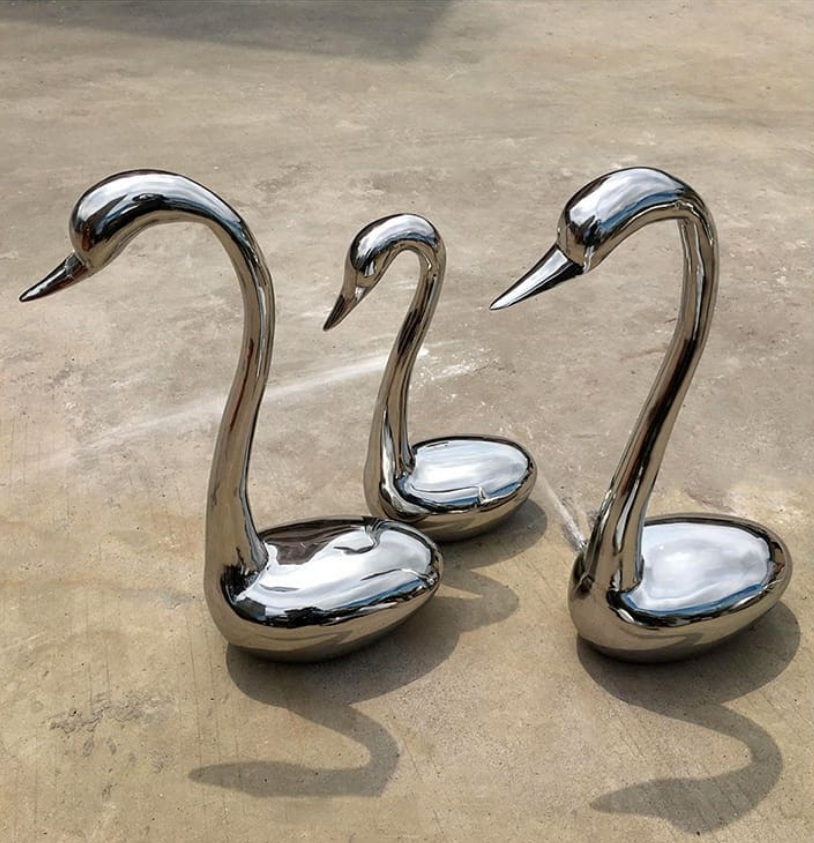 three swans mirror sculptures (3)