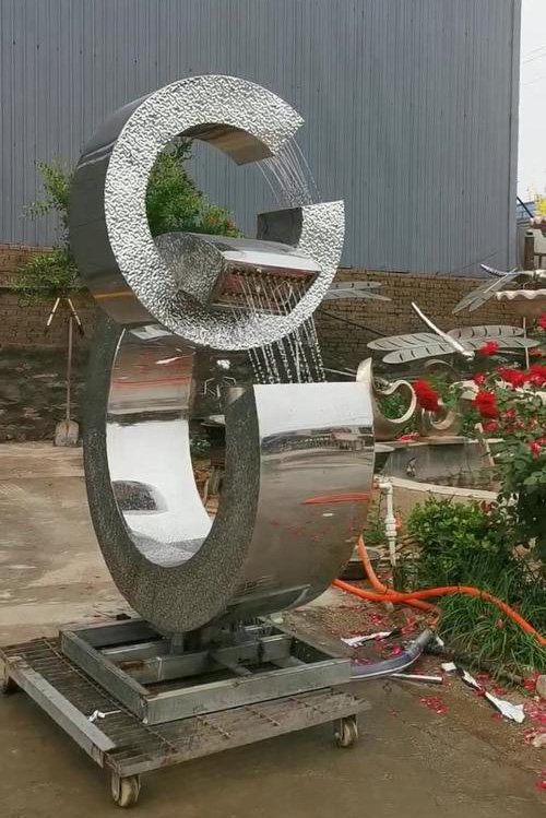 stainless steel circles waterfall sculpture