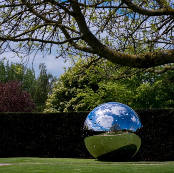 garden stainless steel sphere sculpture in scene