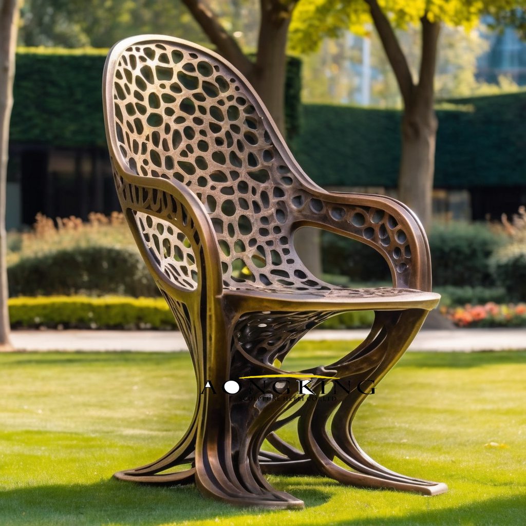 Perforated bronze Armchair